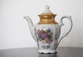 Antique porcelain teapot with flower print Royalty Free Stock Photo