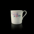 antique crockery for table setting. vintage porcelain tea cup with floral pattern Royalty Free Stock Photo