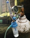 Antique and portable oxygen gas cylinder is placed in hospital.