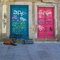 Antique Portuguese Architecture: Old Colorful Doors, Writings and Guitar in the Street - Portugal Royalty Free Stock Photo