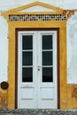 Antique Portuguese Architecture: Old White Door in a Street- Portugal Royalty Free Stock Photo