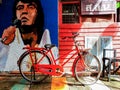 An antique postal bike hits the sun.