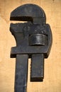 Antique primitive pipe wrench Royalty Free Stock Photo