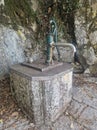 Antique pump for pumping out spring water