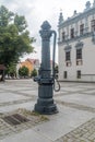 Antique pump for water on market square in Chelmno