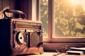 An antique radio stands by the window, a nostalgic reminder of a bygone era. Royalty Free Stock Photo