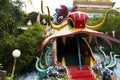 Antique red stairs of Chinese Dragon Tunnel to Ku Ha Mangkorn Sawan or Bua Kli Cave of Wat Ban Tham temple for thai people travel