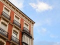 Antique residential building facade in Madrid, Spain. Real estate business, classic architecture style concepts Royalty Free Stock Photo