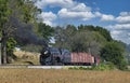 Antique Restored Freight Train Approaching and Blowing Black Smoke