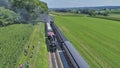 Antique Restored Steam Locomotive Blowing Smoke and Steam