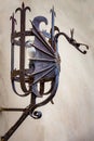 Antique rod iron lamp in the shape of a dragon in Panzano