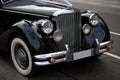 Antique Rolls Royce emblem on car