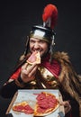 Angry ancient rome warrior with pizza