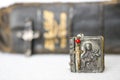 Antique Rosary Crucifix with Case with Bible in Background Royalty Free Stock Photo