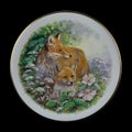 Antique round plate with the image of foxes. round picture for decoupage with animals.