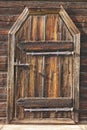 Antique rusted locked wooden door. Finland background heritage