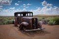 An antique, rusty car circa 1930 at the Petrified Forest National Park