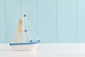 Antique sail boat Toy model with rope and seashell - Nautical ba Royalty Free Stock Photo