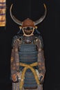 Antique samurai armour with Minamoto family emblem