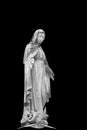 Antique satue of Virgin Mary isolated on black background Royalty Free Stock Photo