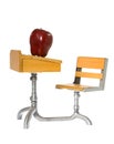 Antique School Desk with Shiny Red Apple Royalty Free Stock Photo