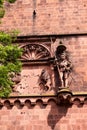 Antique sculpture of a knight and a wall fragment of Heidelberg Royalty Free Stock Photo