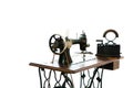 Antique sewing manual machine and old coal iron - vintage tailor