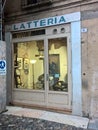 Antique shop that has kept the sign of an ancient dairy in the historic center of Mantua