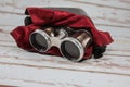 Antique Silver Binoculars with Leather Case and Red Fabric Cladding Royalty Free Stock Photo