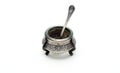 Antique silver salt shaker with spoon. Royalty Free Stock Photo