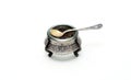 Antique silver salt shaker with spoon. Royalty Free Stock Photo