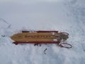 Antique sled stuck in snow Royalty Free Stock Photo