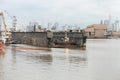 Antique small dry dock for repairing small ships in harbor of Buenis Aires. Repair ship in poor condition