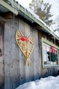 Antique Snowshoes on a Weathered Wood Barn Wall