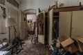 antique spinning wheel and closets in a abandoned house