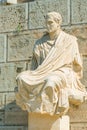 Antique statue of Menander, the ancient Greek playwright and comedian at the Theater of Dionysus, which is one of the most ancient