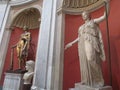 Antique statues of marble and bronze at the Vatican Museum, Rome, Italy.