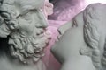 Antique statues of woman and man heads close up. Concept of style, vintage, love.