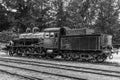 Old steam locomotive standing on some old railroad track Royalty Free Stock Photo