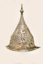 Antique steel helmet with a beautiful pattern isolated on a white background, Flanders. Cold weapons, duels