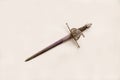 Antique steel rapier with a beautiful handle isolated on a white background, France. Cold weapons, duels