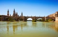 Antique stone bridge over Ebro river in Zaragoza Royalty Free Stock Photo