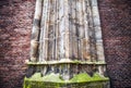 Antique stone column of old church wall as texture close-up. Photo Background Royalty Free Stock Photo