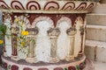 Antique stone floor flowerpot in Greek or Roman style with pillar ornament