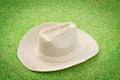 Antique straw hat on green grass Royalty Free Stock Photo