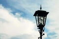 Antique Street Light Isolated On A Blue Sky Background
