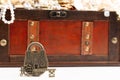 An Antique Style Lock and a Treasure Chest FIlled with Gold and DIamond Treasures Royalty Free Stock Photo