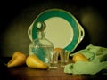 Antique-style still life with pears and alcohol.