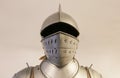 Medieval knightly armor on a light background.
