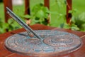 Antique sundial with a beautiful dial and ornament. Royalty Free Stock Photo